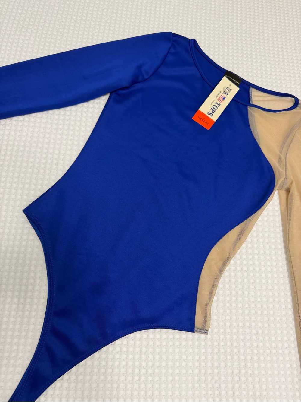 Women’s bodysuits Size M. New with tag